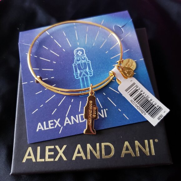 NWT Alex and Ani nutcracker Charm Gold Bangle Comes with Box & Card - Picture 3 of 4